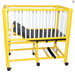 MJM International Yellow PVC Frame Pediatric Crib bed With Side Rails Elevated Head View