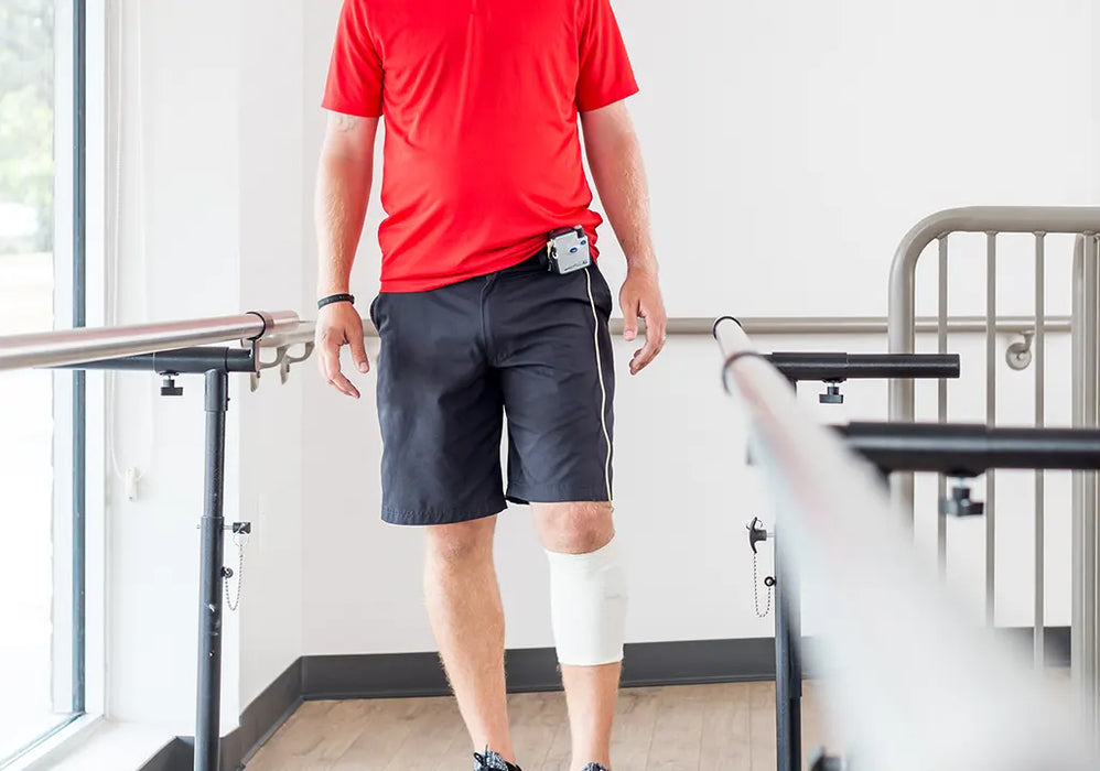 Neuro Rehab Recovery ODFS Pace XL Neuro Rehabilitation System for Drop Foot, Stroke, Multiple Sclerosis and Upper Motor Neuron Conditions FDA-Cleared FES/NMES Foot-Controlled Stimulator Sample Photo while Wearing it 