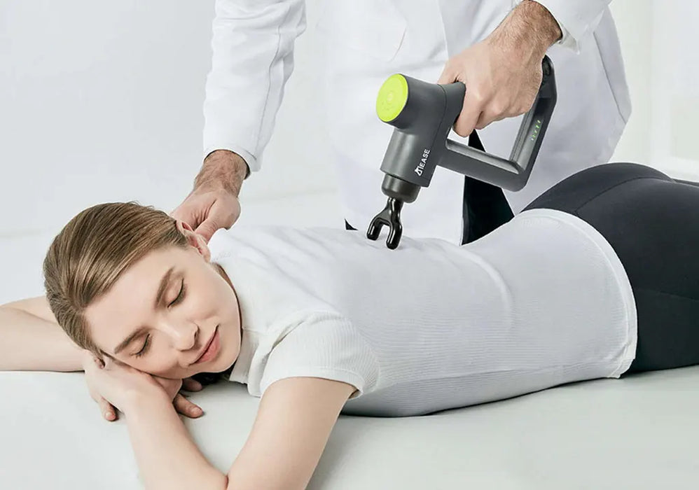 Neuro Rehab Recovery Percussive Massage Gun for Deep Tissue Muscle Recovery, Circulation Support, Adjustable Speeds and Quiet Ergonomic Design a Sample Photo Massaging her Back