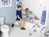 Nuprodx MC6000TiltPed Pediatric Tilt In Space Commode Tub Transfer System With Patient And Caregiver Wheelchair Base View