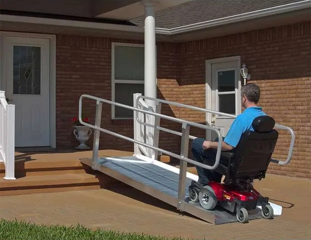PVI OnTrac Ramp Outside Doorstep With Rider In Scooter View