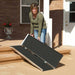 PVI Singlefold Ramp Outside Doorway With Person Folding Ramp View