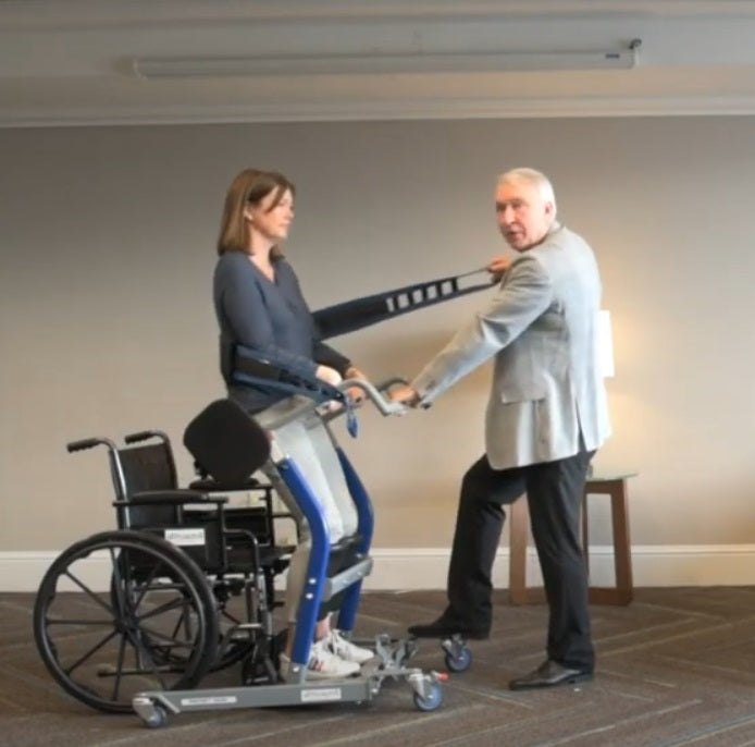 Proactive Medical Protekt® Dash Sit to Stand Lift With Patient And Caregiver In Wheelchair Transfer Using Transfer Belt View