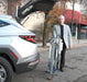 Proactive Medical Protekt® Take-A-Long Folding Electric Patient Lift With Caregiver Ready To Load Folded Lift In Car Trunk View