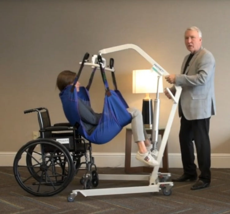 Proactive Medical Protekt® Transformer Hydraulic Patient Lift With Patient And Caregiver In Wheelchair Transfer View