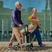 Rollz Air Carbon Rollator In Mint Green Side View Of An Active User Outdoors.