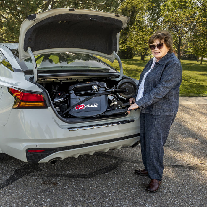 SNAPnGO Mobility Scooter Sport Edition Folded Inside Car Trunk View
