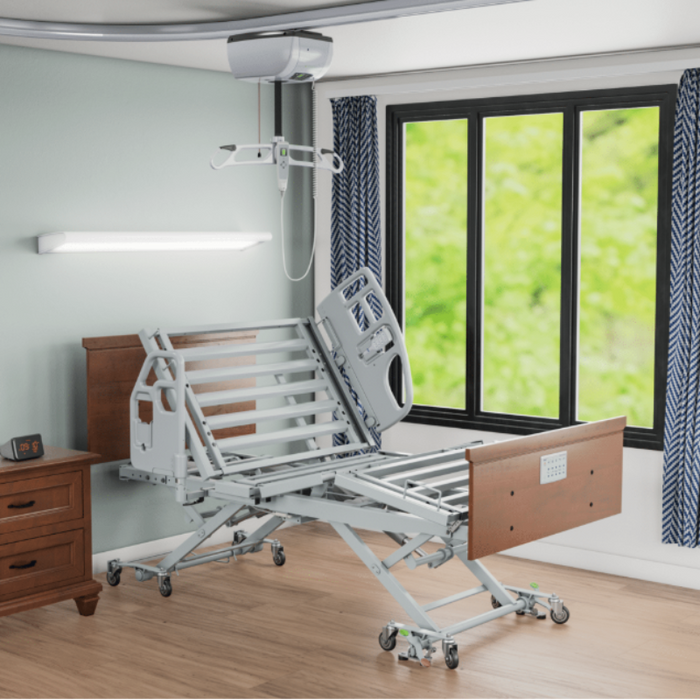 Span America ReadyWide Adjustable Bariatric Bed With Integrated Width Expansion And Smart Stop Safety In Long Term Care Setting