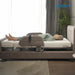 An elderly woman lies on aStarsleep Orin Arlo ergonomic rotating chair bed with a brown headboard and side rails in a modern bedroom setting. The brand logo 'Ari' by 'Bed & Bad' is visible in the top right corner.