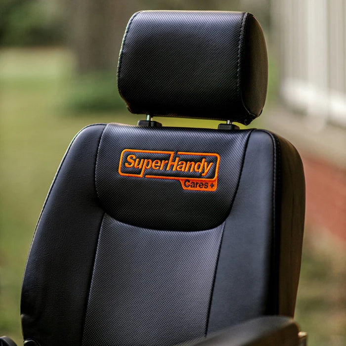 SuperHandy GoRide CRX Reclining Powerchair Close Up Backrest With Logo Leather Upholstery View