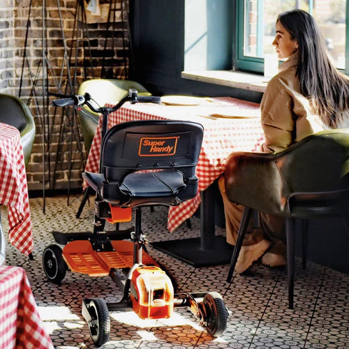 SuperHandy Passport Pro Foldable 4 Wheel Mobility Scooter Inside Cafe Compact View
