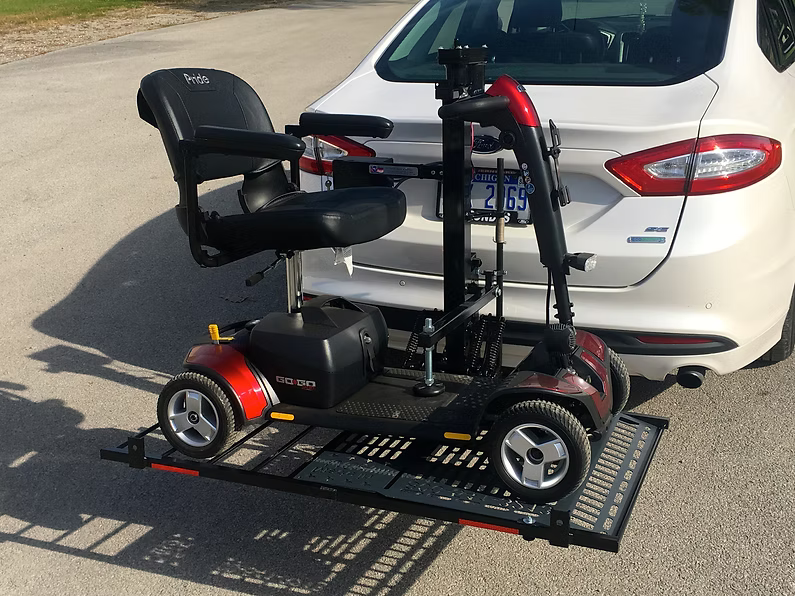 Wheelchair Carrier Hold N Go Electric Lift Installed In Hitch Receiver With Scooter View