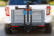 Wheelchair Carrier Mini Electric Lift Installed Into Car Hitch Receiver Folded View