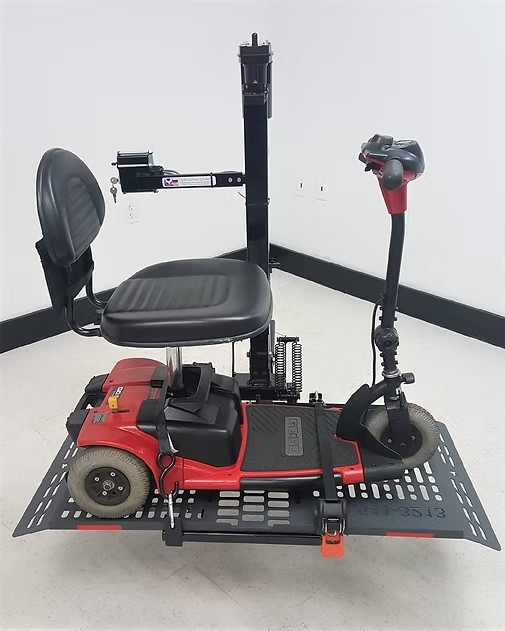 Wheelchair Carrier Mini Electric Lift With Scooter Loaded In Lifting View