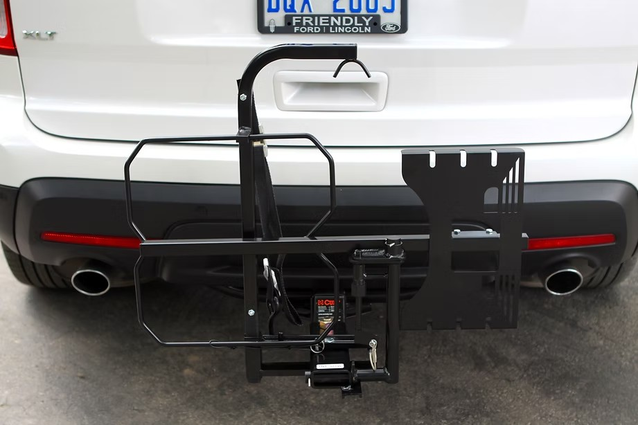 Wheelchair Carrier Tilt N Tote Installed In Car Hitch Receiver Folded View