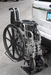 Wheelchair Carrier Tote Installed In Car Hitch Receiver With Folded Wheelchair Side View