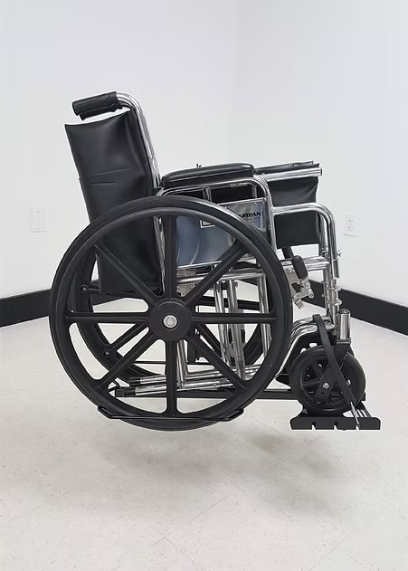 Wheelchair Carrier Tote With Folded Wheelchair Wheels in Saddle Securely Strap Hook View