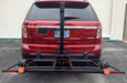 Wheelchair Carrier XL4 Electric Lift Installed Into Car Hitch Receiver View