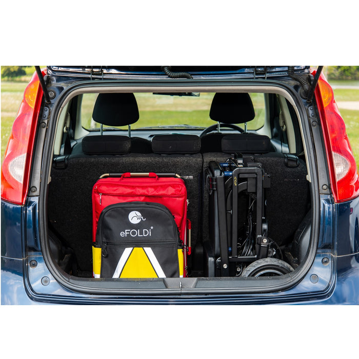 eFoldi Lite Ultra Lightweight Mobility Scooter Folded In Back Of Car Trunk With Bag