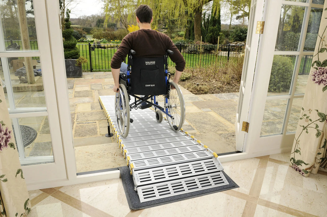 Roll-A-Ramp for wheelchair access in and out of home